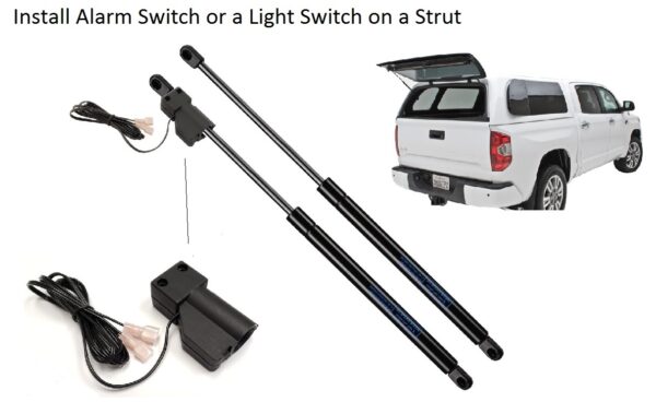 The image shows a pair of black electrical wires and a white truck for the strut switch.